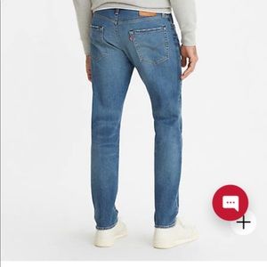 Levi’s 502 taper fit slim jeans in medium wash